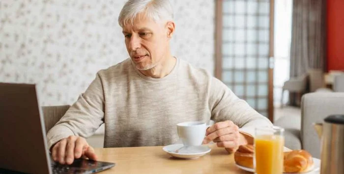 How does the ‘hold harmless’ provision protect beneficiaries from Medicare Part B premium increases?